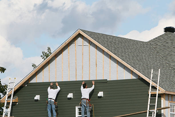 Professional Storm Damage Siding Repair technician working in Marietta, PA